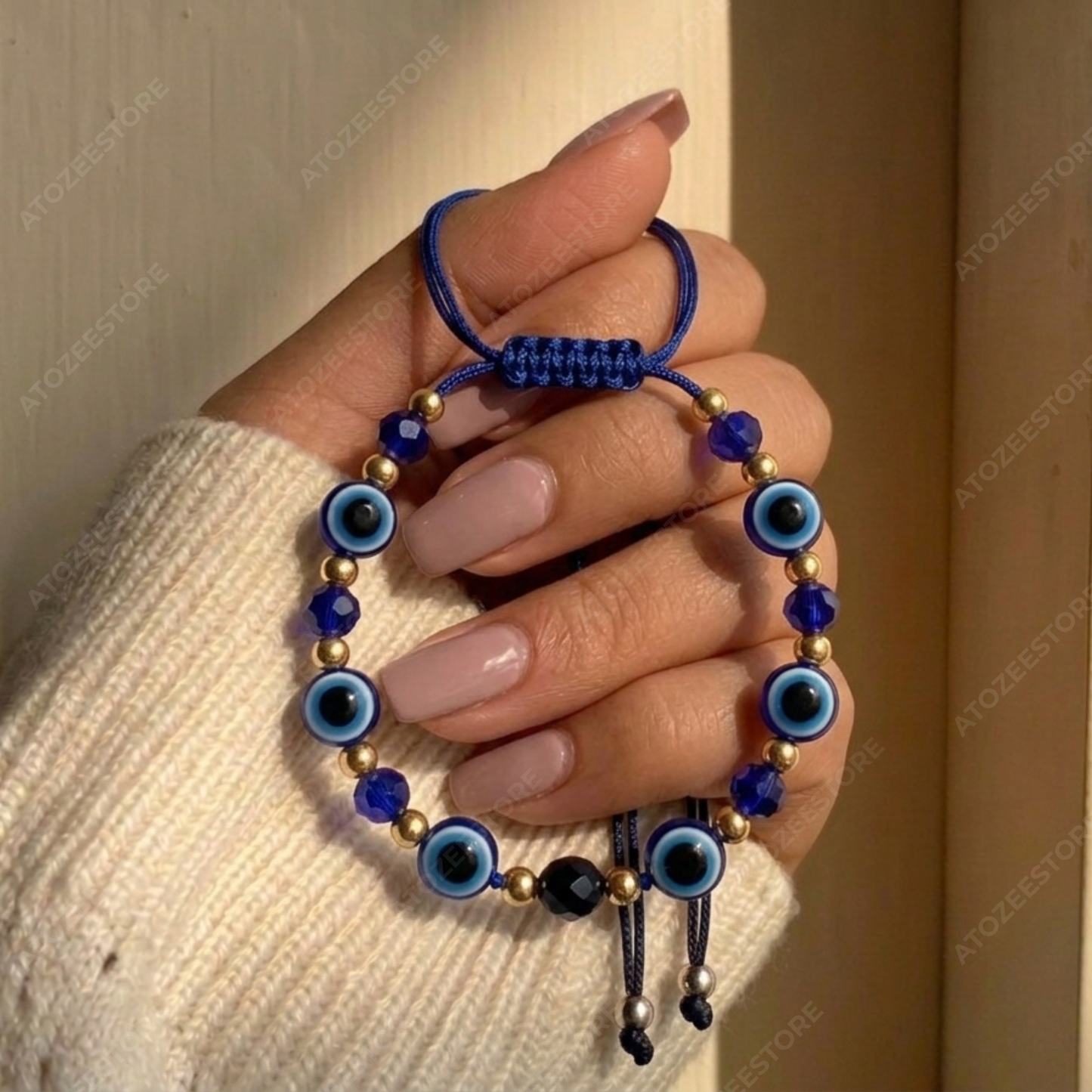 Blue Evil Eye Cord Bracelet with Gold and Black Charm Bead