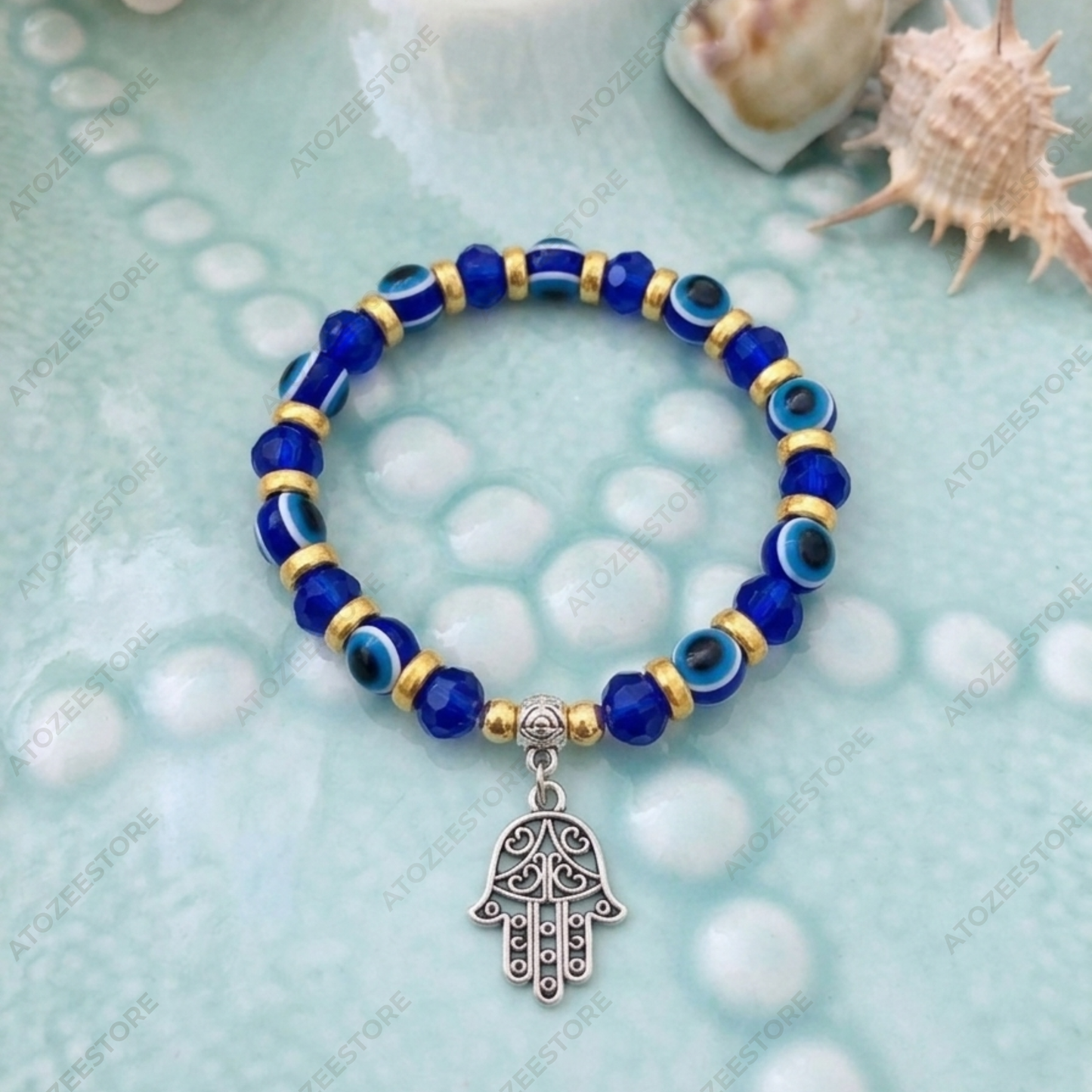 Blue and Gold Beaded Evil Eye Bracelet with Hamsa Hand Hanging Charm