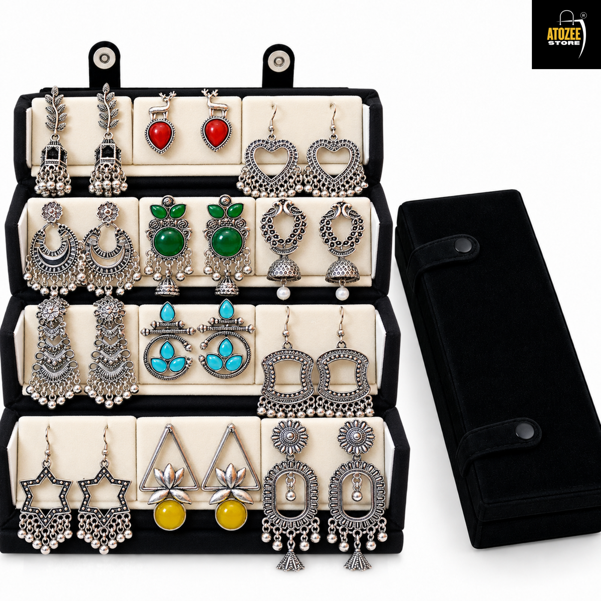 12 pairs of silver oxidised earrings + jhumka with black and white velvet organiser box . make you navratri , traditional , and festive look complete .