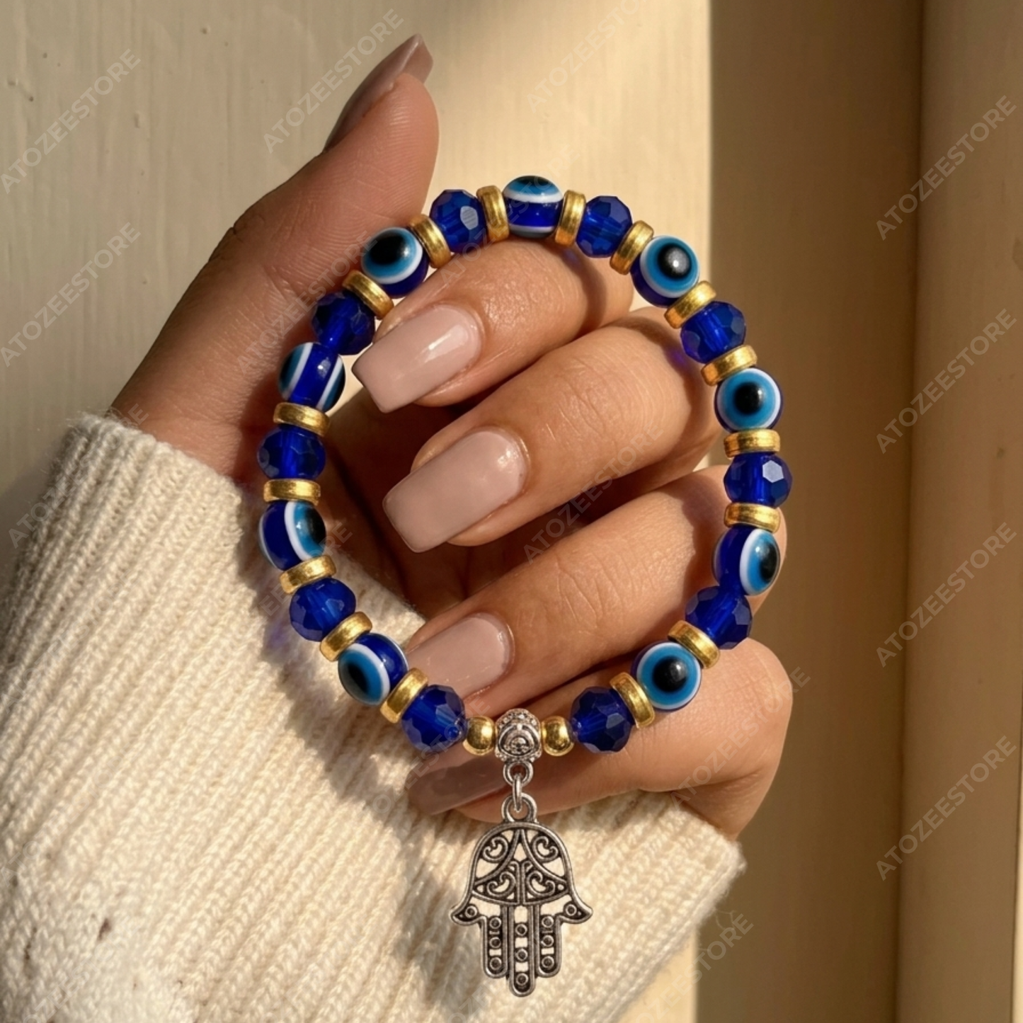 Blue and Gold Beaded Evil Eye Bracelet with Hamsa Hand Hanging Charm