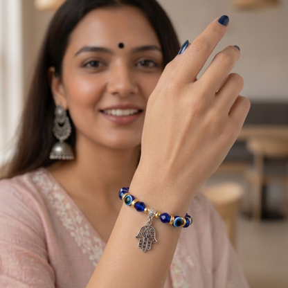 Blue and Gold Beaded Evil Eye Bracelet with Hamsa Hand Hanging Charm