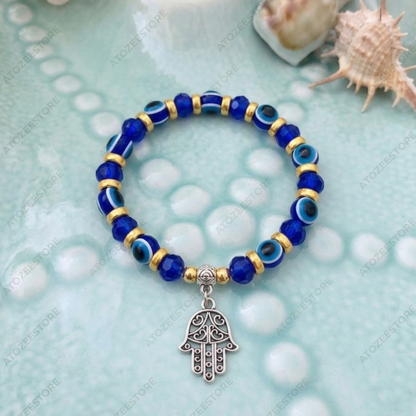 Blue and Gold Beaded Evil Eye Bracelet with Hamsa Hand Hanging Charm