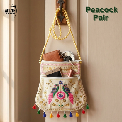 Cream Peacock Handicrafts Cotton Embroidered Sling Bag – Mirror Work & Vibrant Tassels